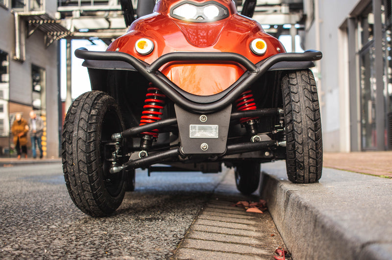 Mini Crosser suspension on pavement kerb