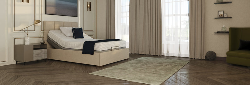 Opera Hagen Adjustable bed in Linen colour. Wide angle image in stylish room. 