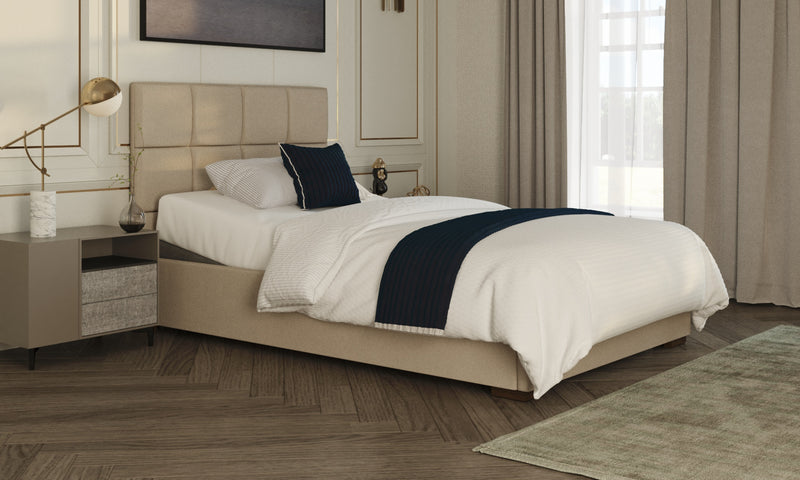 Opera Hagen adjustable bed dressed with white bedding in a stylish room