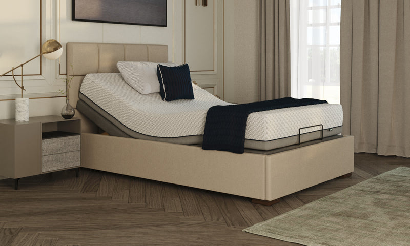 Opera Hagen Adjustable Bed shown in Linen fabric with Emerald headboard