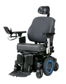 Q 300M Mini Powerchair 3/4 angle view. Blue accents. Sedeo Pro seating.