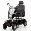 Black mobility scooter with a white background