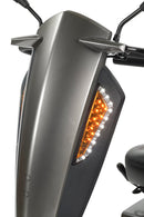 Close-up of the Vita E headlight and indicator on a white background